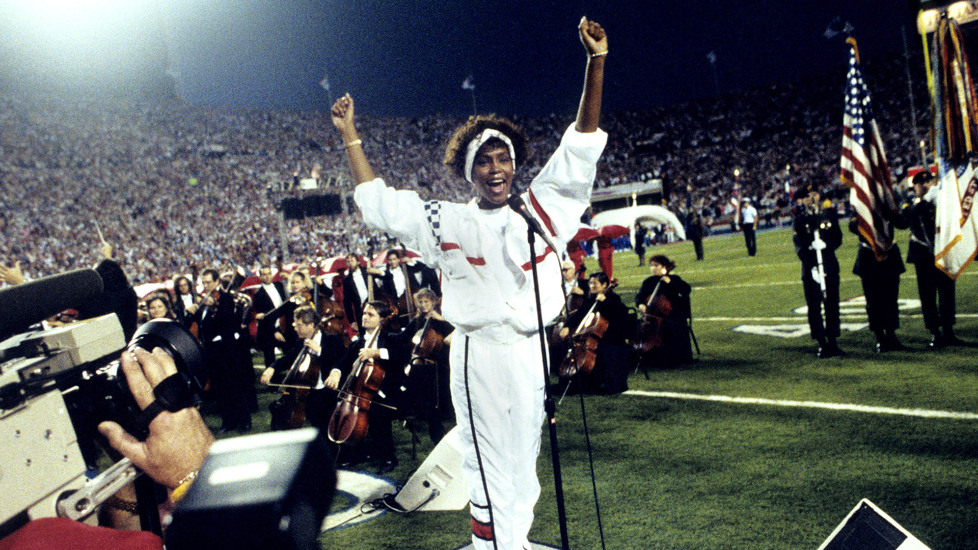 Singer Whitney Houston sings the National Anthem before a 20-19 New Giants wino ver the Buffalo Bills at Super Bowl XXV on January 27, 1991 at Houlihan's Stadium in Tampa Bay, Florida. (Al Messerschmidt via AP)